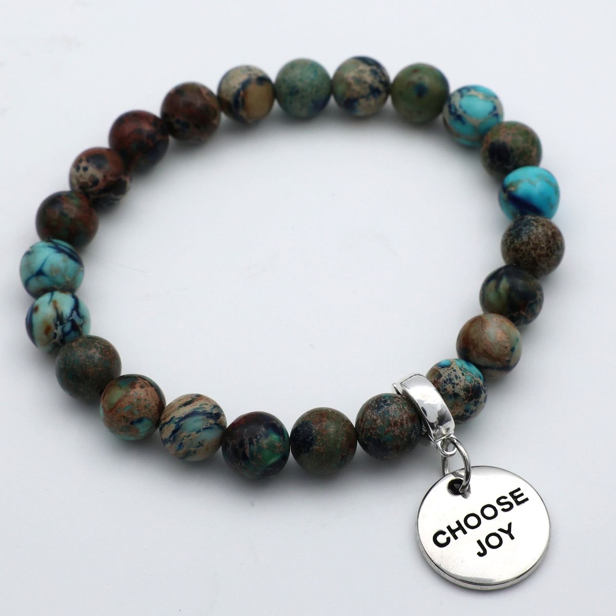 Bracelet with multicolored beads and a 'CHOOSE JOY' charm on a white background