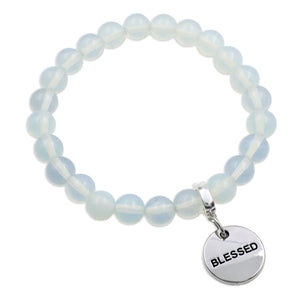 Opalite beaded bracelet with a 'BLESSED' charm on a white background