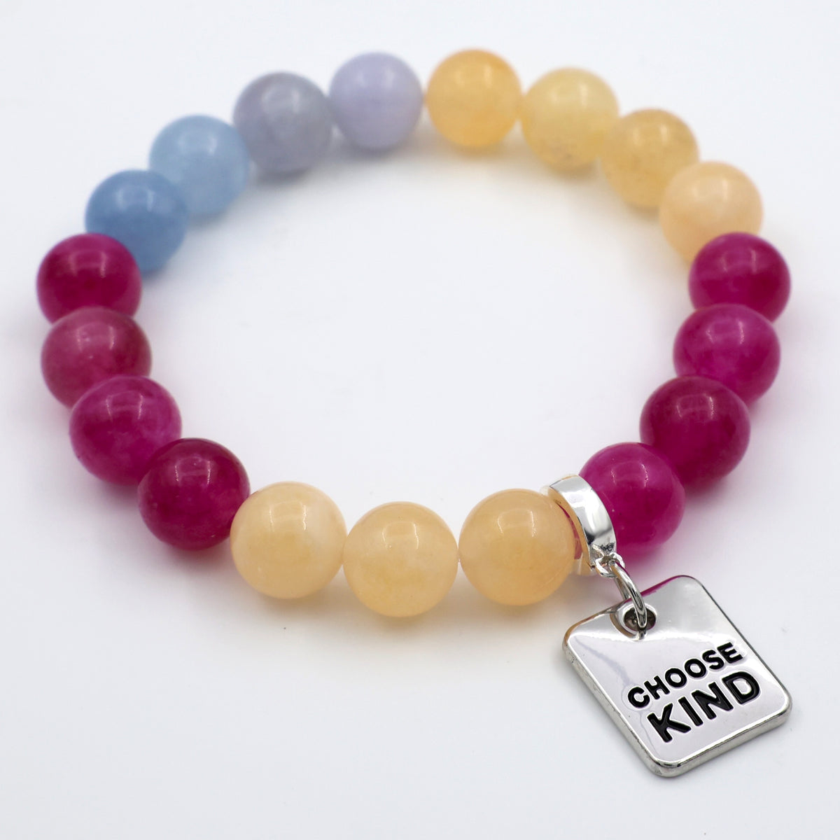 Colorful beaded bracelet with a 'Choose Kind' charm on a white background