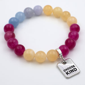 Colorful beaded bracelet with a 'Choose Kind' charm on a white background