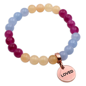 Multicolored beaded bracelet with a rose gold charm labeled 'LOVED' on a white background