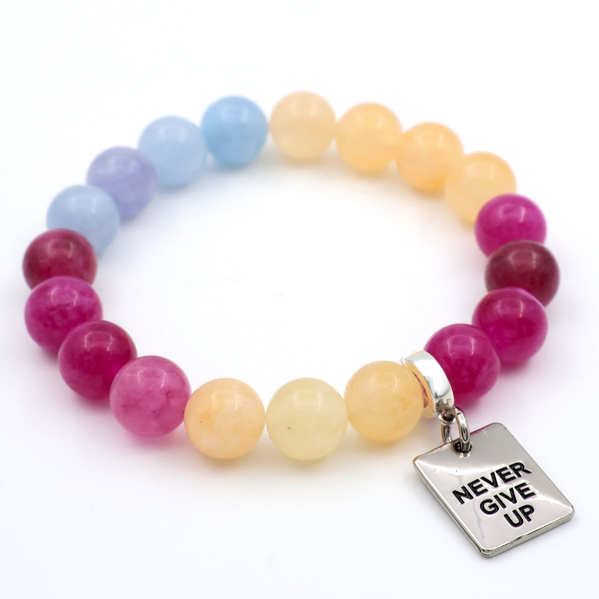 Never give up silver charm on bright bracelet with pink yellow and purple stone beads. 
