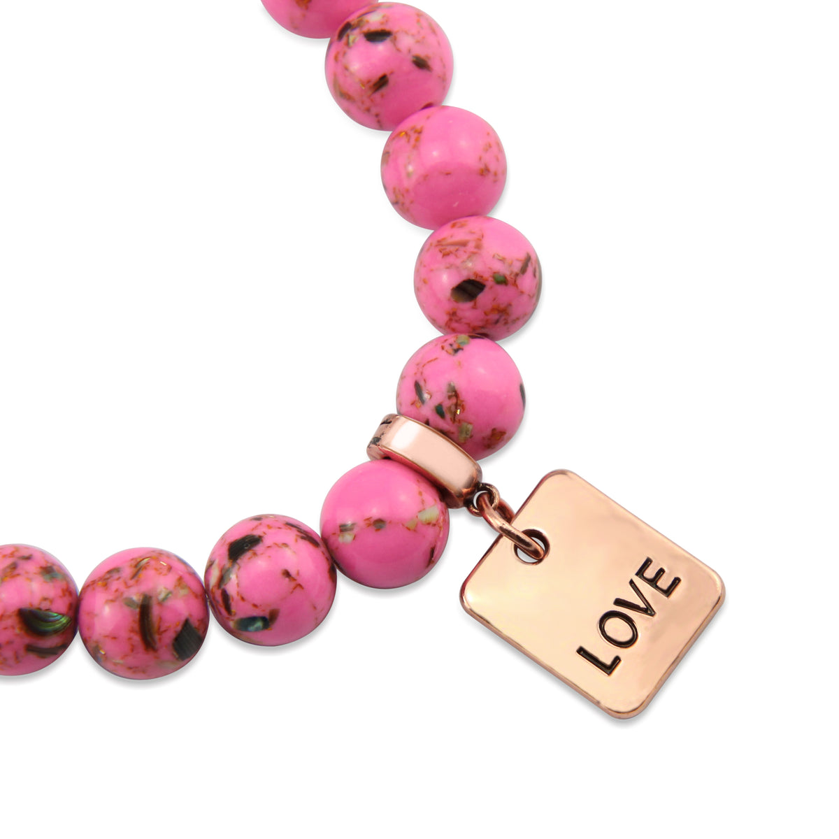 Pink beaded bracelet with a rose gold 'LOVE' tag charm on a white background