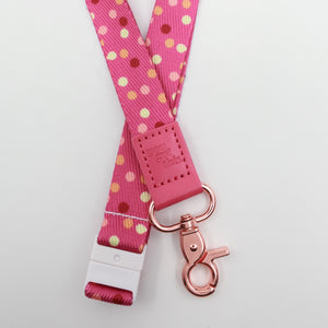You Got This embossed on a pink polka dot lanyard with pink trim and a lobster clasp.
