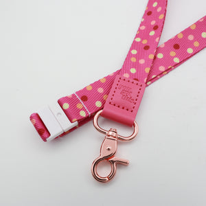 You Got This embossed on a pink polka dot lanyard with pink trim and a lobster clasp.