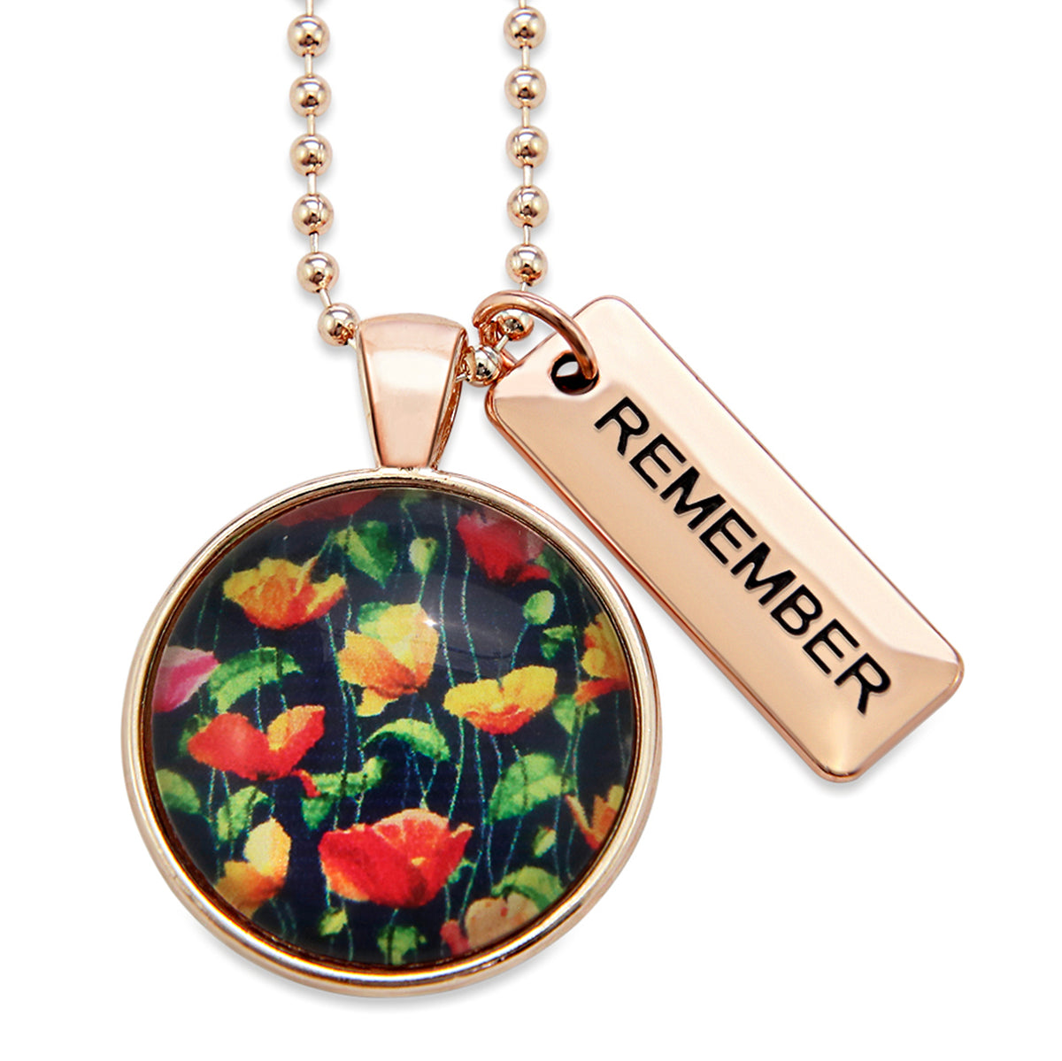 Necklace with floral pendant and 'REMEMBER' tag on a white background
