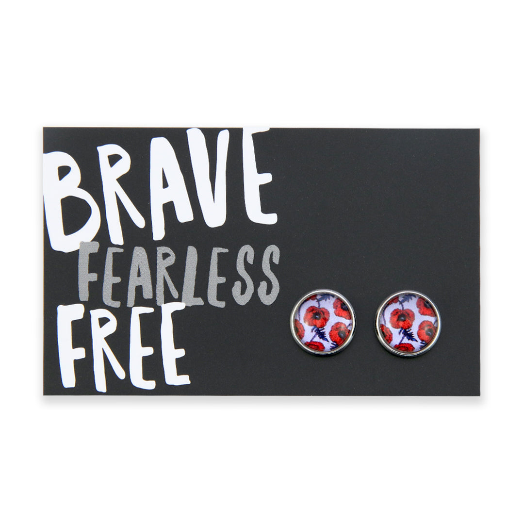 Pair of floral earrings on a card with 'Brave Fearless Free' text