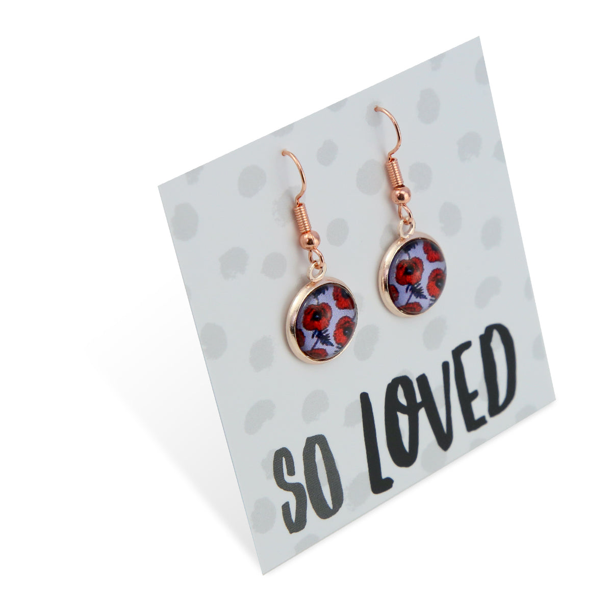 Earrings on a card with 'So Loved' text