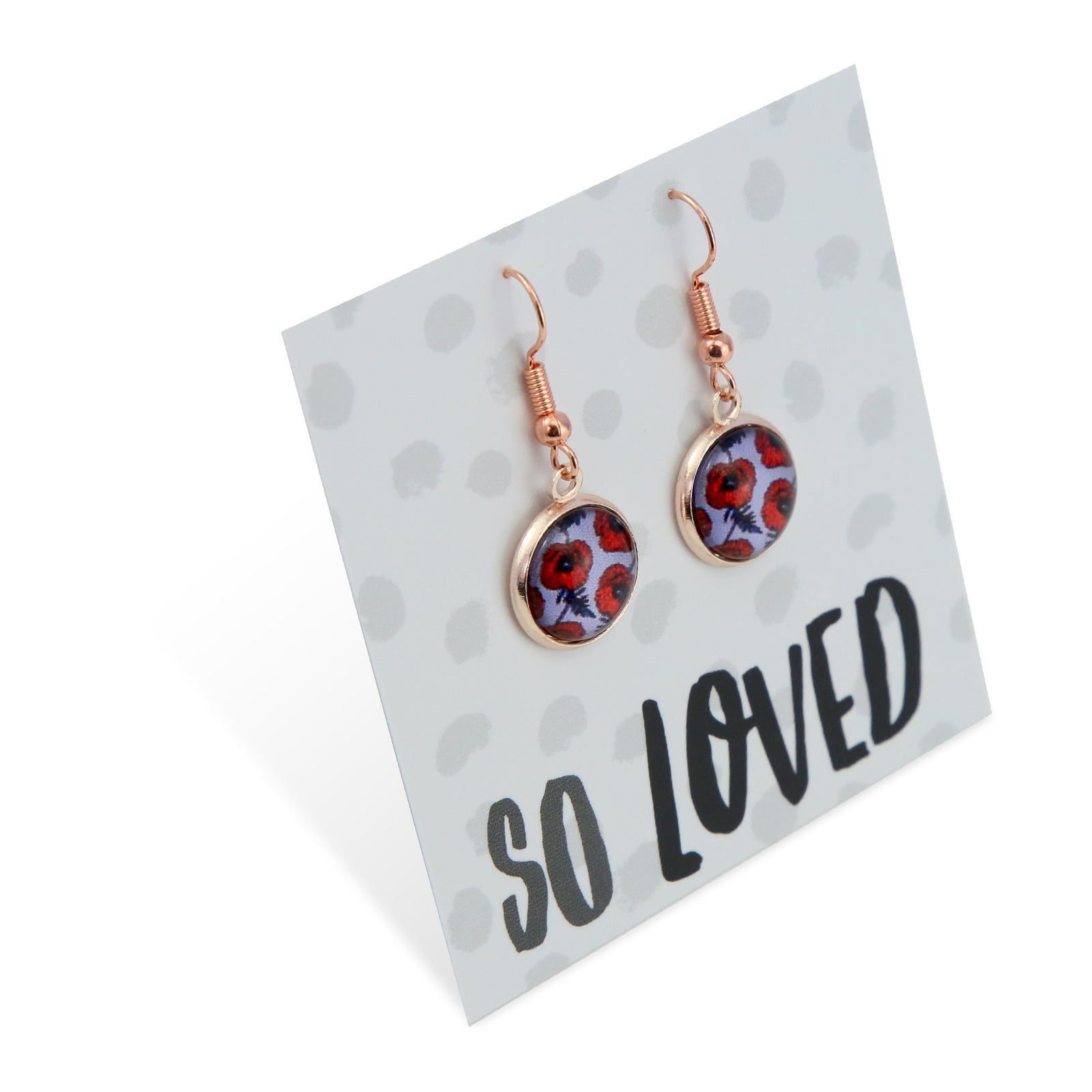 Earrings on a card with 'So Loved' text
