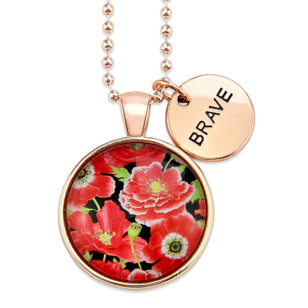 Necklace with floral pendant and 'BRAVE' tag on a white background