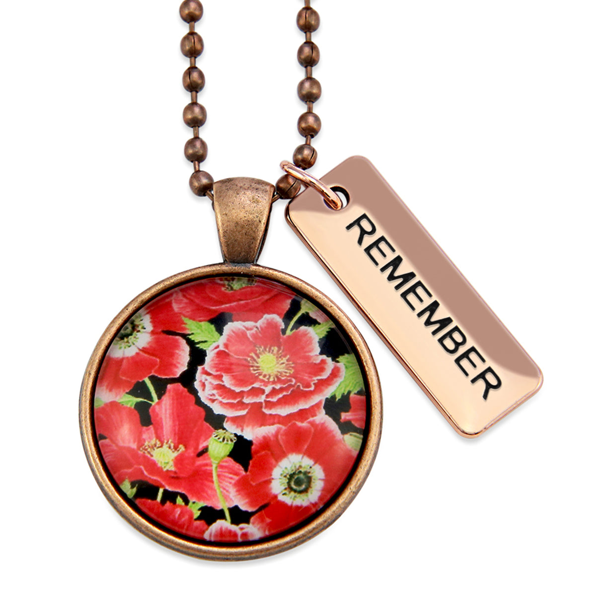 Necklace with floral pendant and 'REMEMBER' tag on a white background