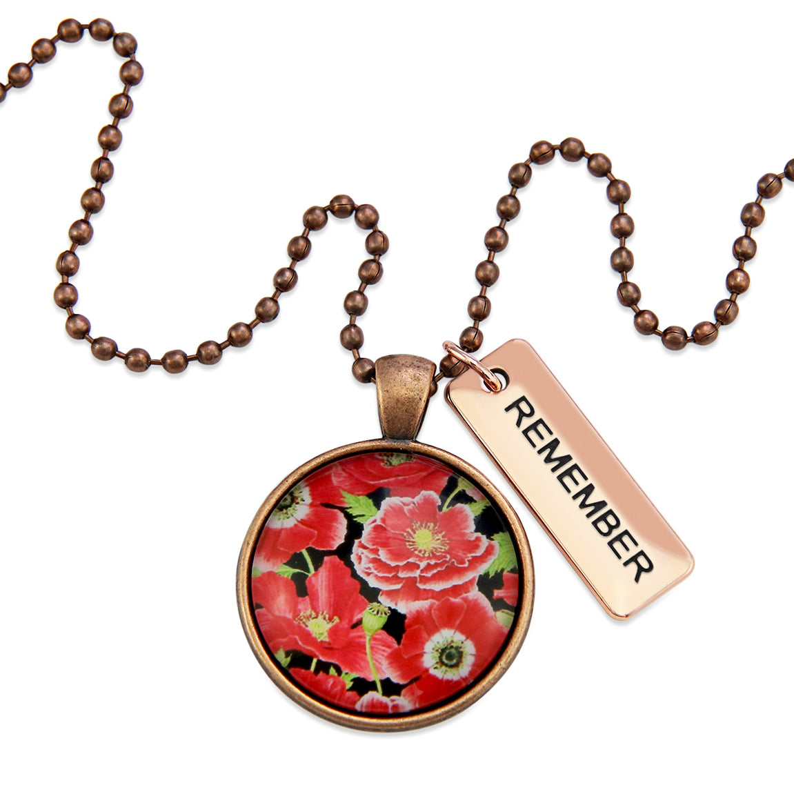 Necklace with floral pendant and 'REMEMBER' tag on a white background