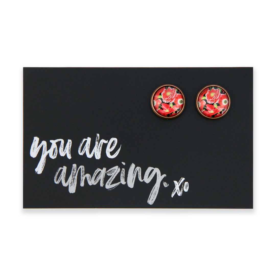 Floral earrings on a card with 'you are amazing' text