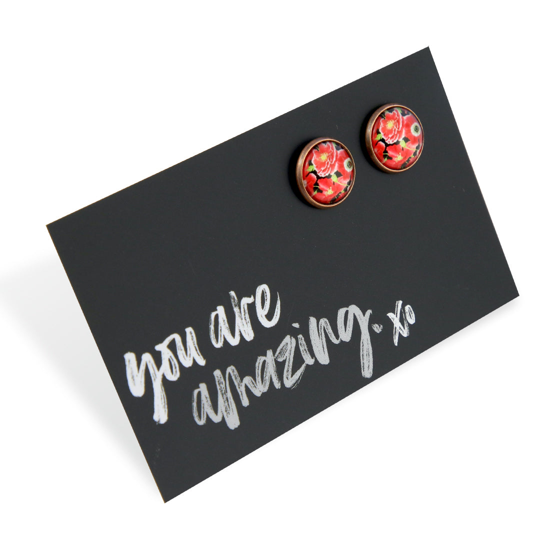 Floral earrings on a card with 'you are amazing' text