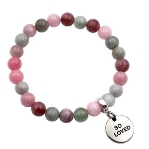 Multicolored beaded bracelet with a 'So Loved' charm on a white background