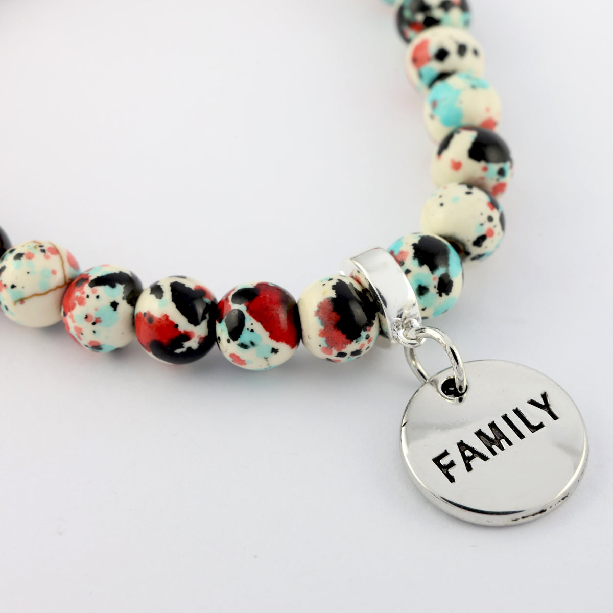 Stone Bracelet - Rebel Splash Speckled Howlite 8mm Beads - With Silver Word charm