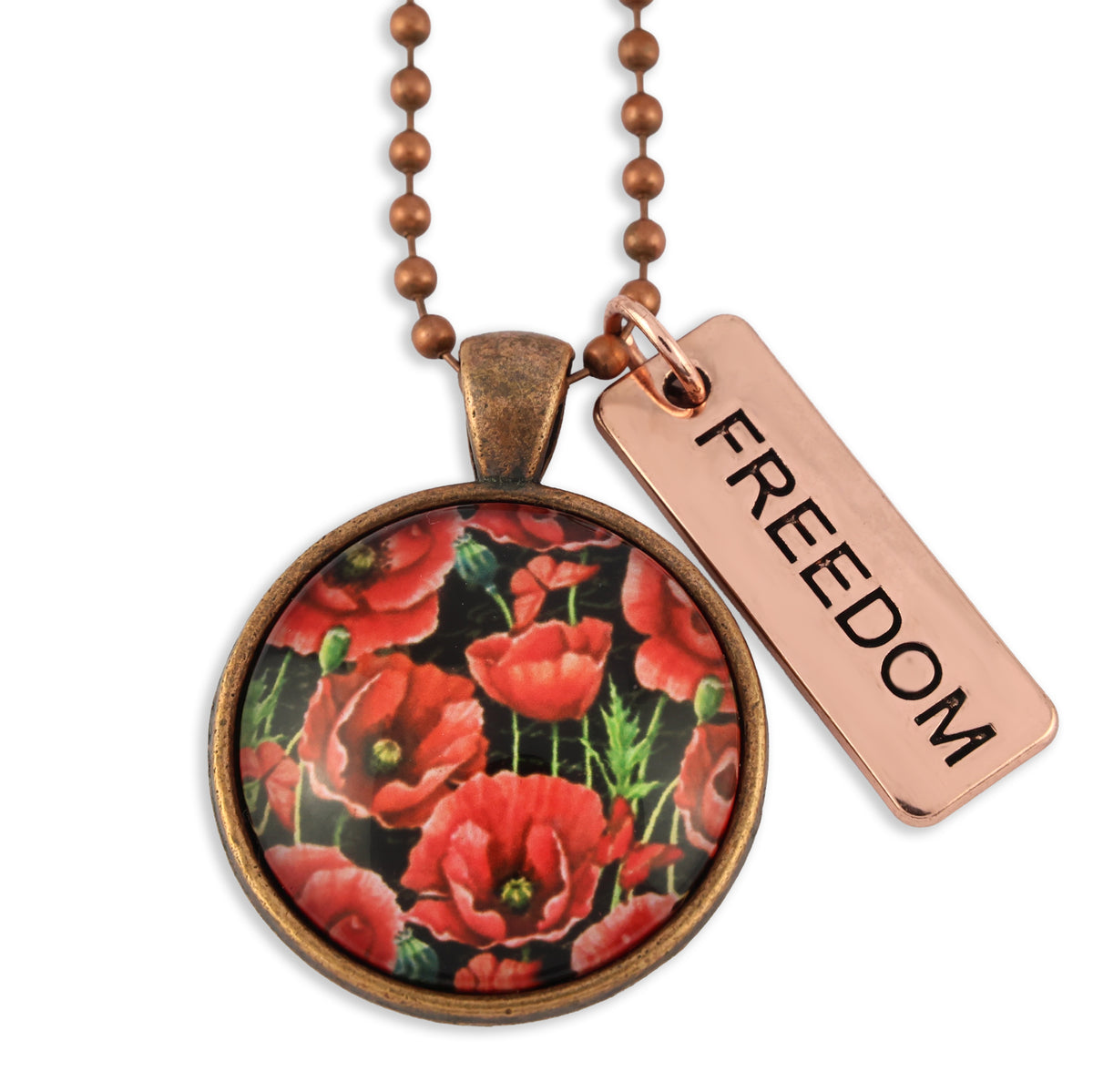 Necklace with red floral pendant and 'FREEDOM' tag on a white background