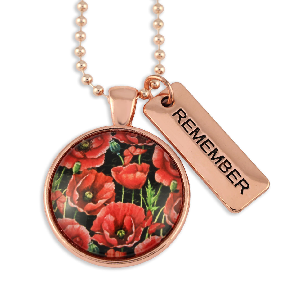 Necklace with floral pendant and 'REMEMBER' tag on a white background