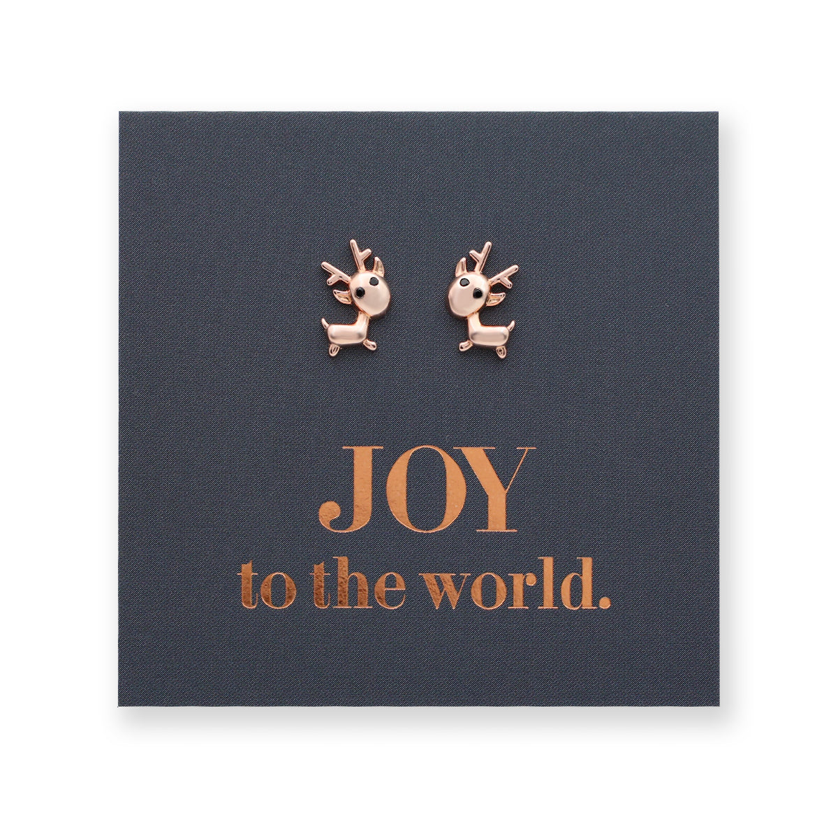 Rose gold reindeer Christmas stud earrings on a black card that says 'Joy To The World'.