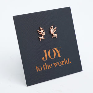 Rose gold reindeer earrings on a black card with 'JOY to the world' text.