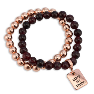 Two beaded bracelets with rose gold and black beads, and a 'Love My Tribe' tag on a white background.