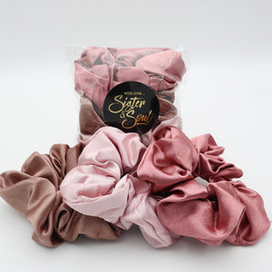 Set of pink scrunchies with a 'Sister & Soul' label on a white background