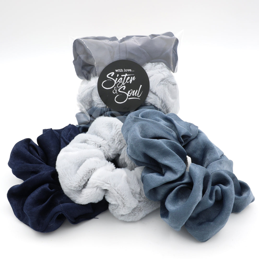 Set of three scrunchies in navy, gray, and blue with a 'Sister & Soul' label on a white background.
