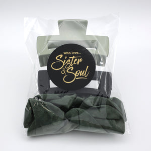 Packaged hair accessories with 'Sister & Soul' label on a white background