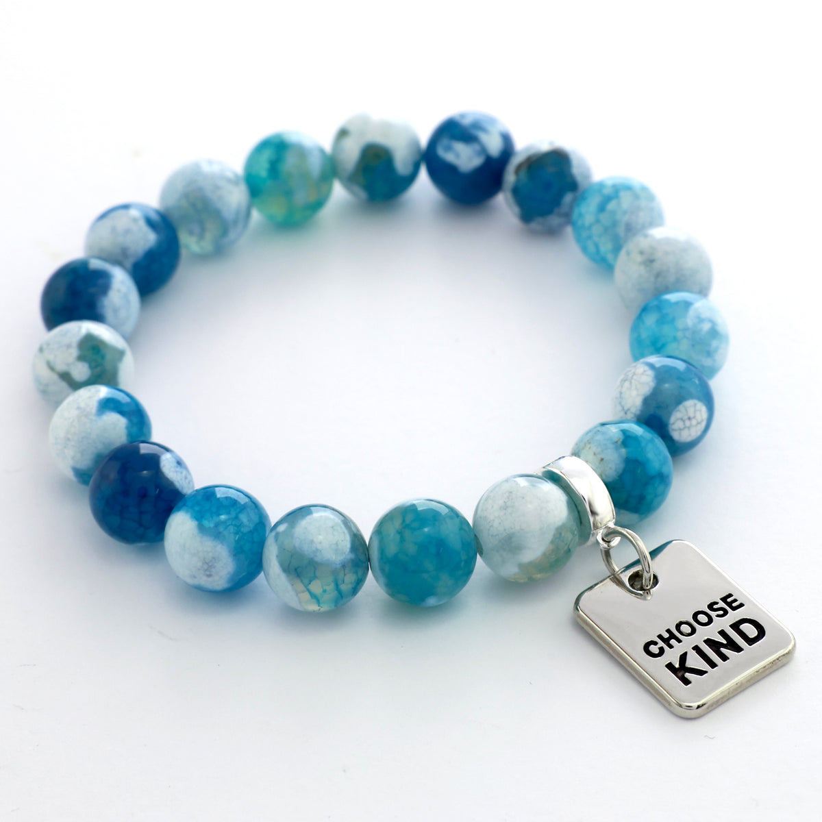 Blue and white beaded bracelet with a 'Choose Kind' charm on a white background