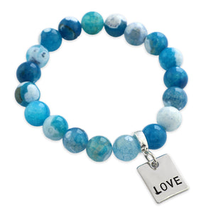 Blue beaded bracelet with a 'LOVE' charm on a white background