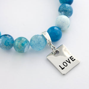 LOVE charm on blue stone bracelet