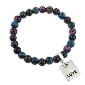 Multicolored beaded bracelet with a 'LOVE' charm on a white background