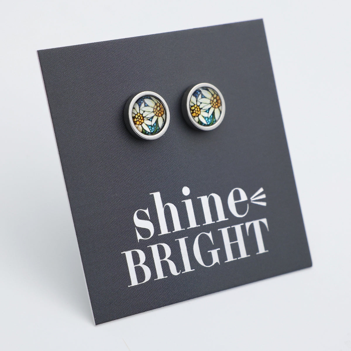 Floral earrings on a 'shine BRIGHT' card