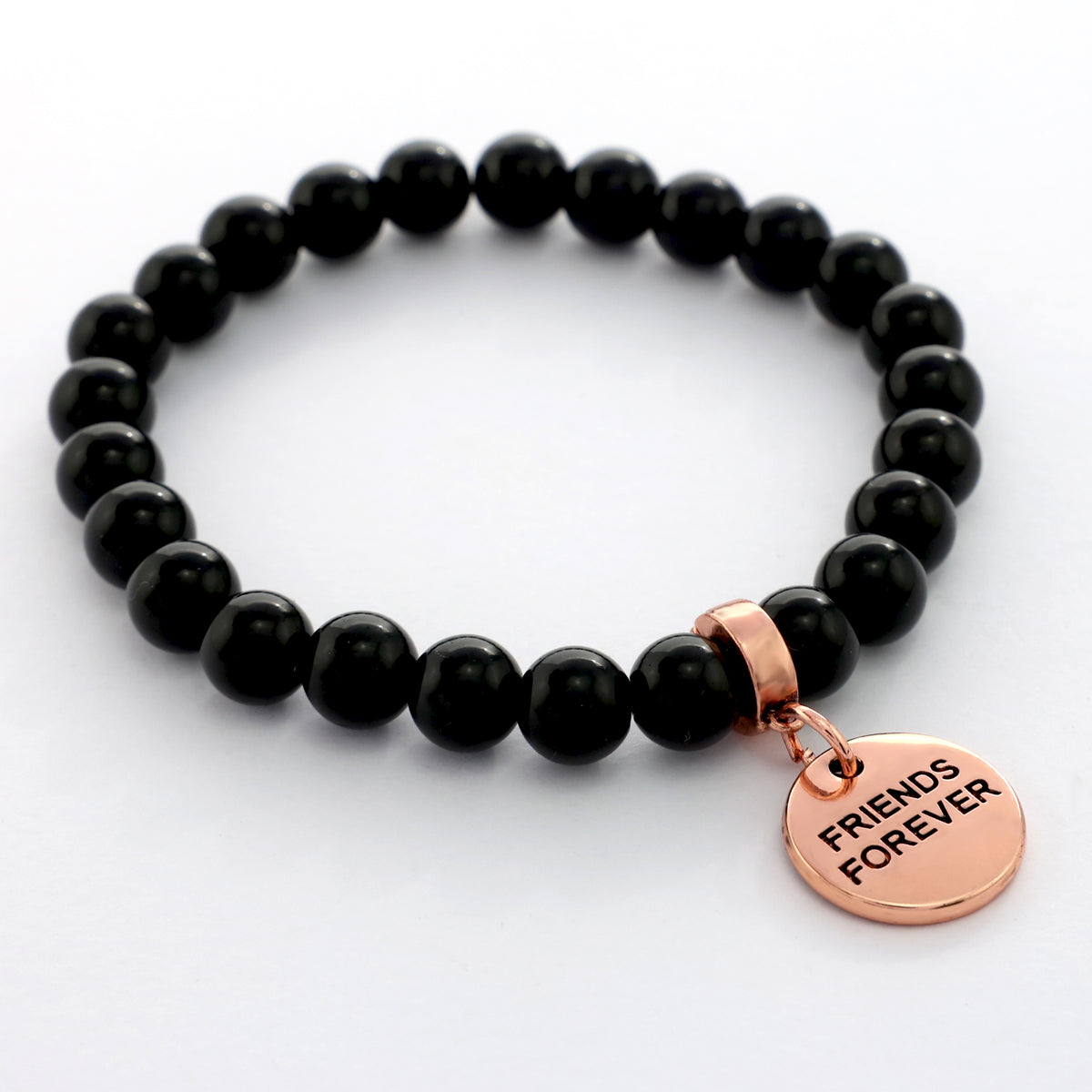 Black beaded bracelet with a rose gold 'Friends Forever' charm on a white background