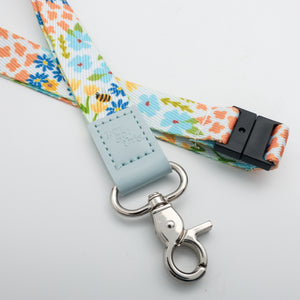 You Got This embossed on a colourful floral lanyard with pale blue trim and a lobster clasp.