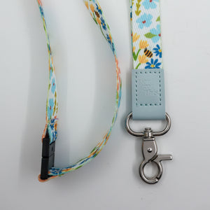 You Got This embossed on a colourful floral lanyard with pale blue trim and a lobster clasp.