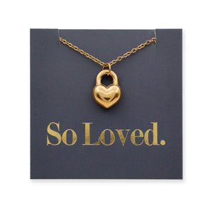 Gold heart-shaped lock necklace on a card with 'So Loved' text