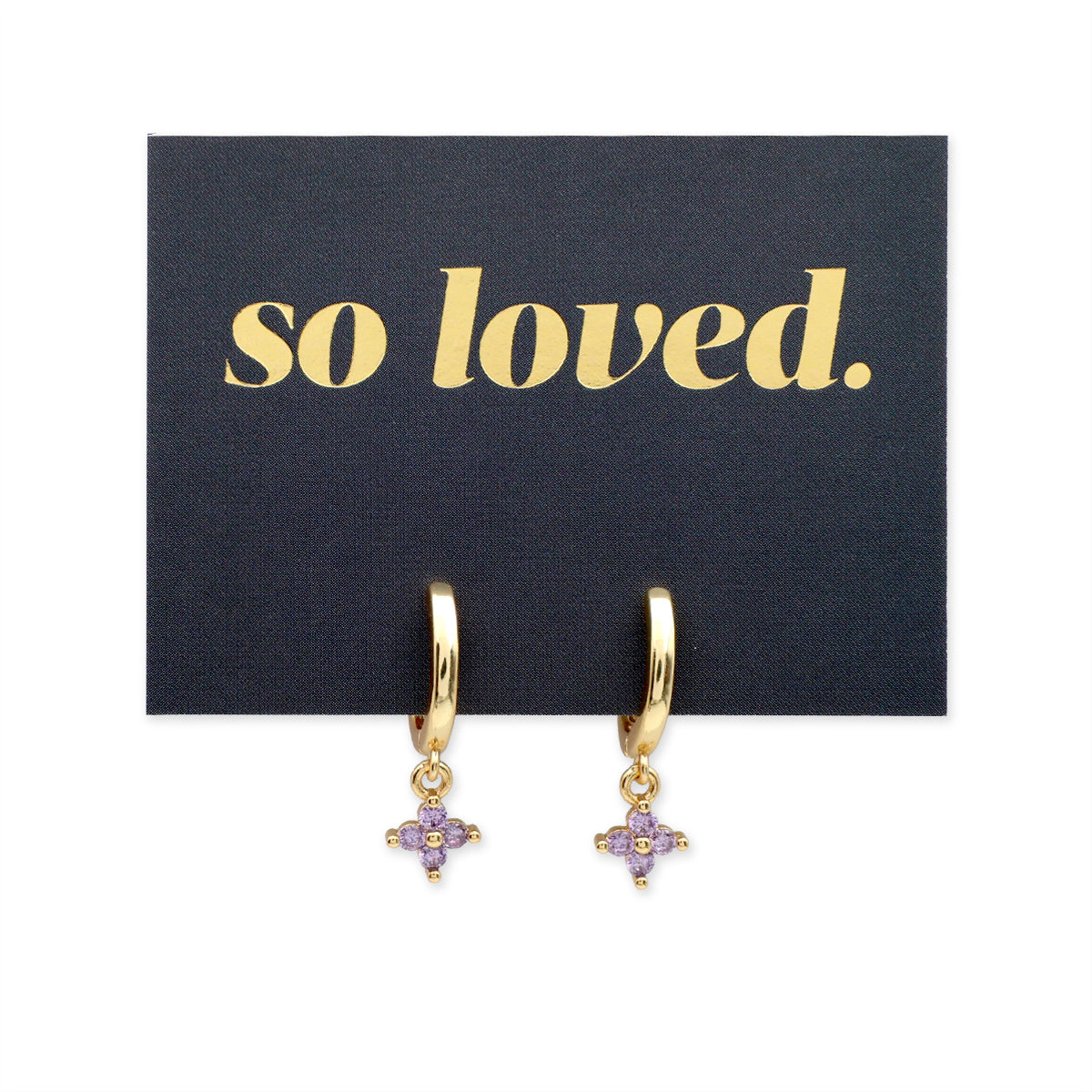 Gold hoop earrings with purple stones on a 'so loved' card