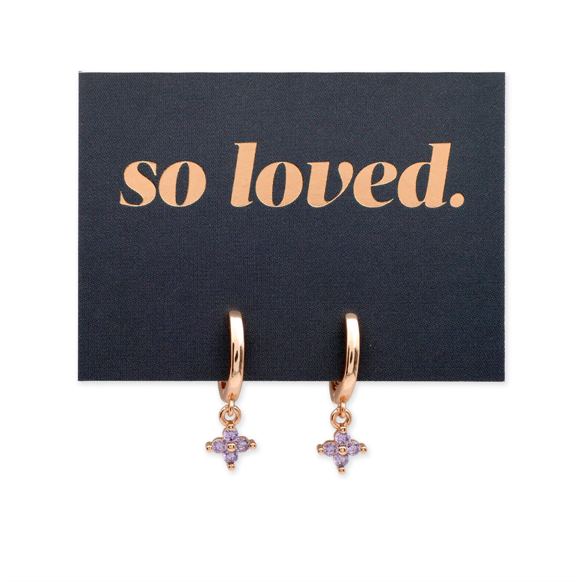 Rose gold earrings with purple stones on a 'so loved' card
