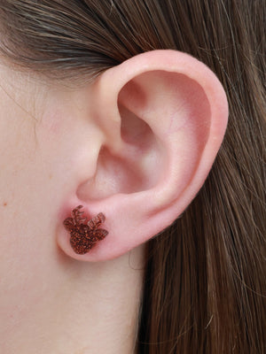 Spark Your Joy reindeer acrylic glitter stud earrings in chestnut glitter worn on an ear to show size and fit