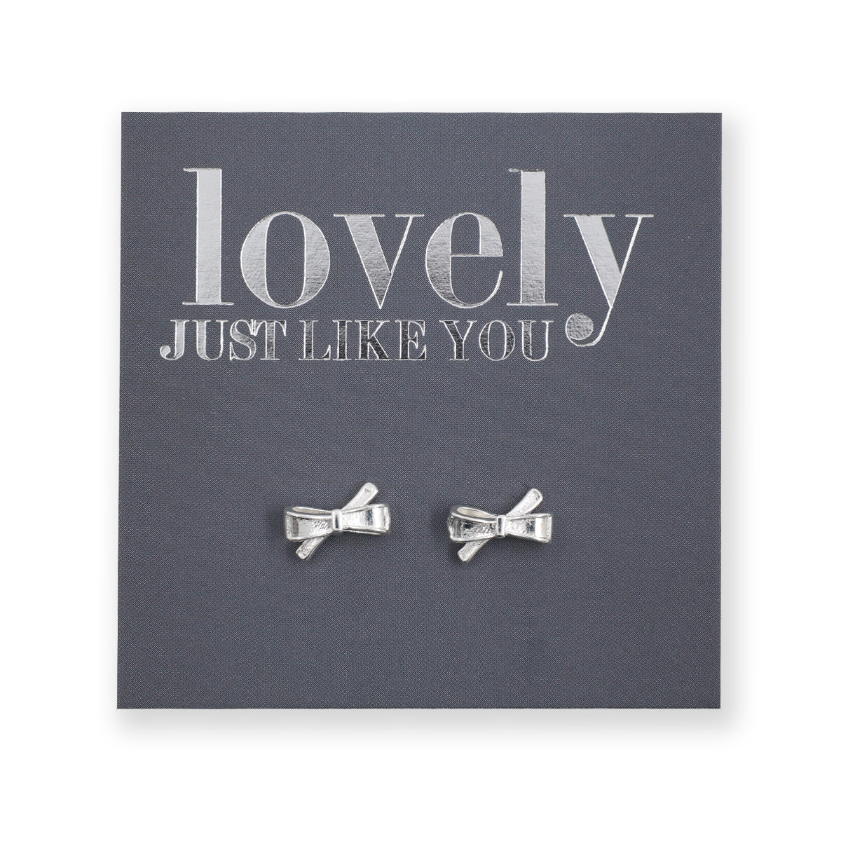 silver bows on a grey card that says "lovely just like you" on a white background 