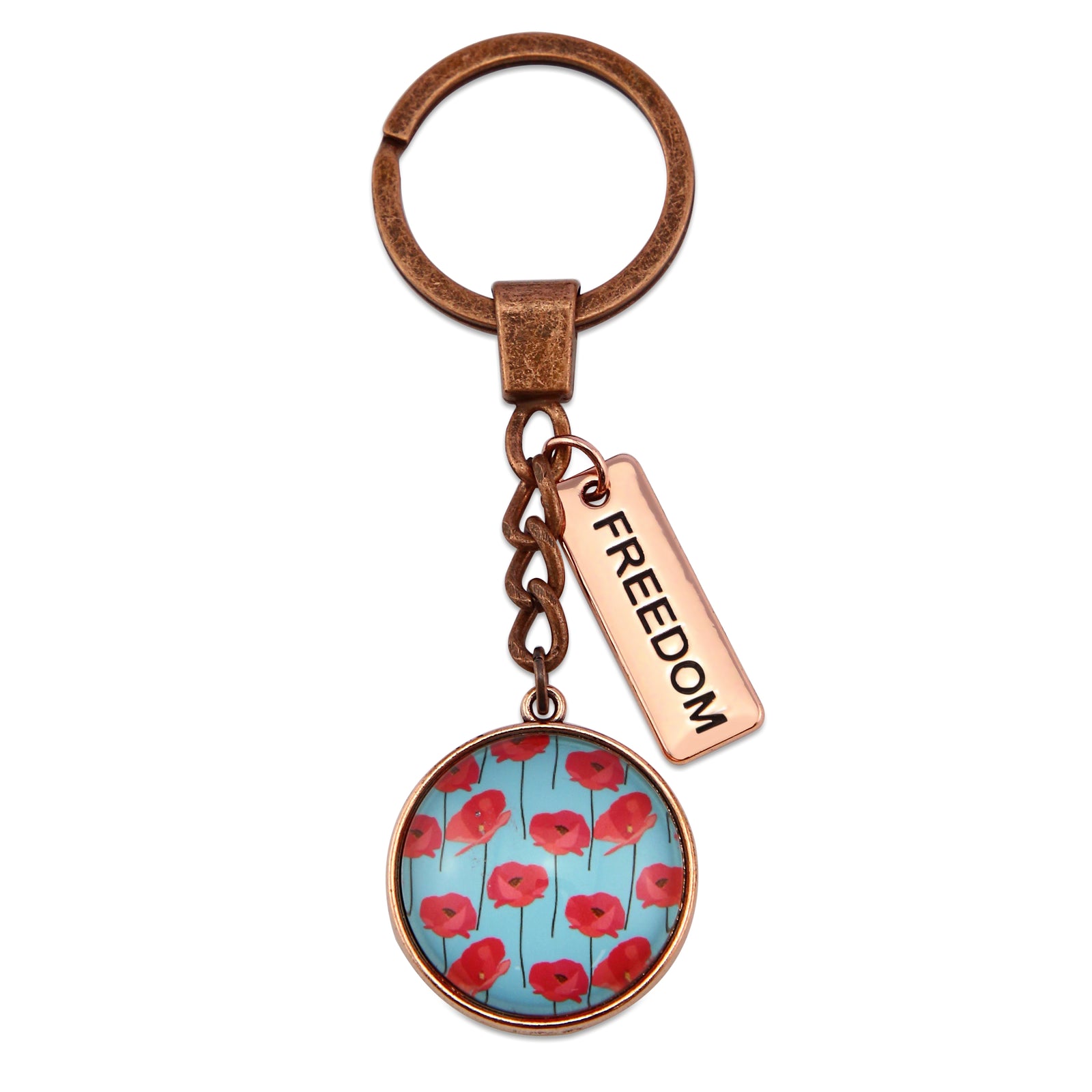 Keychain with floral design and 'FREEDOM' tag on a white background