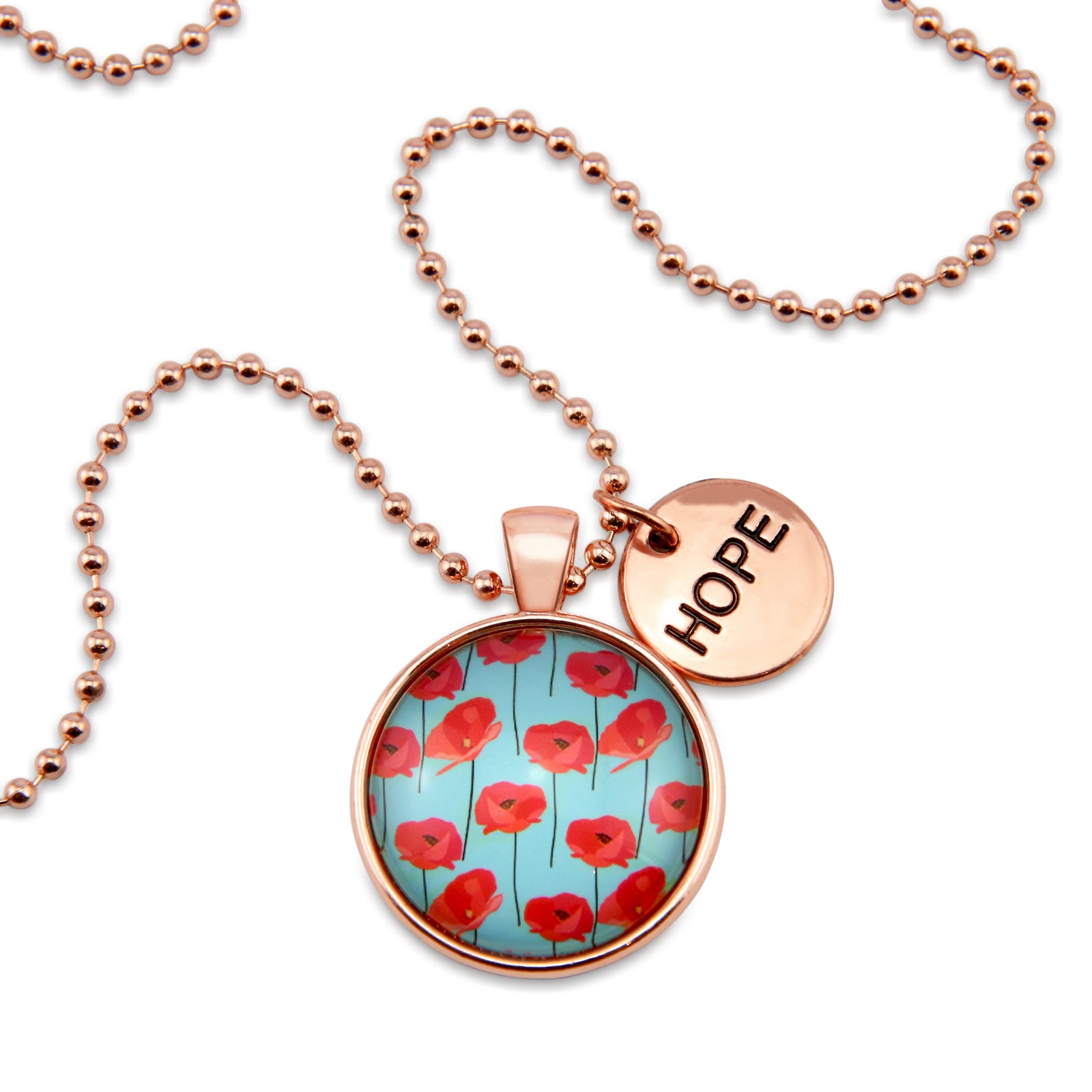 Necklace with red floral pendant and 'HOPE' tag on white background