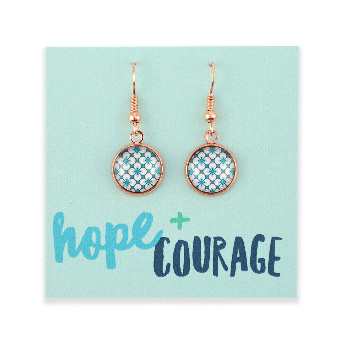 Teal print silver dangle earrings on hope and courage inspiring word card on white background.