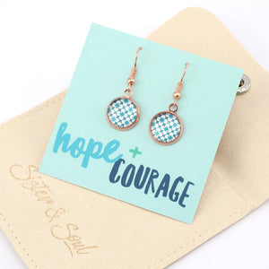 Teal print silver dangle earrings on hope and courage inspiring word card on white background.