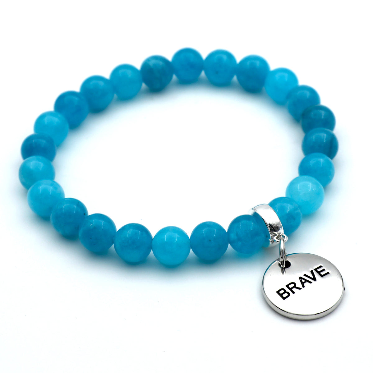 Blue beaded bracelet with a 'BRAVE' charm on a white background