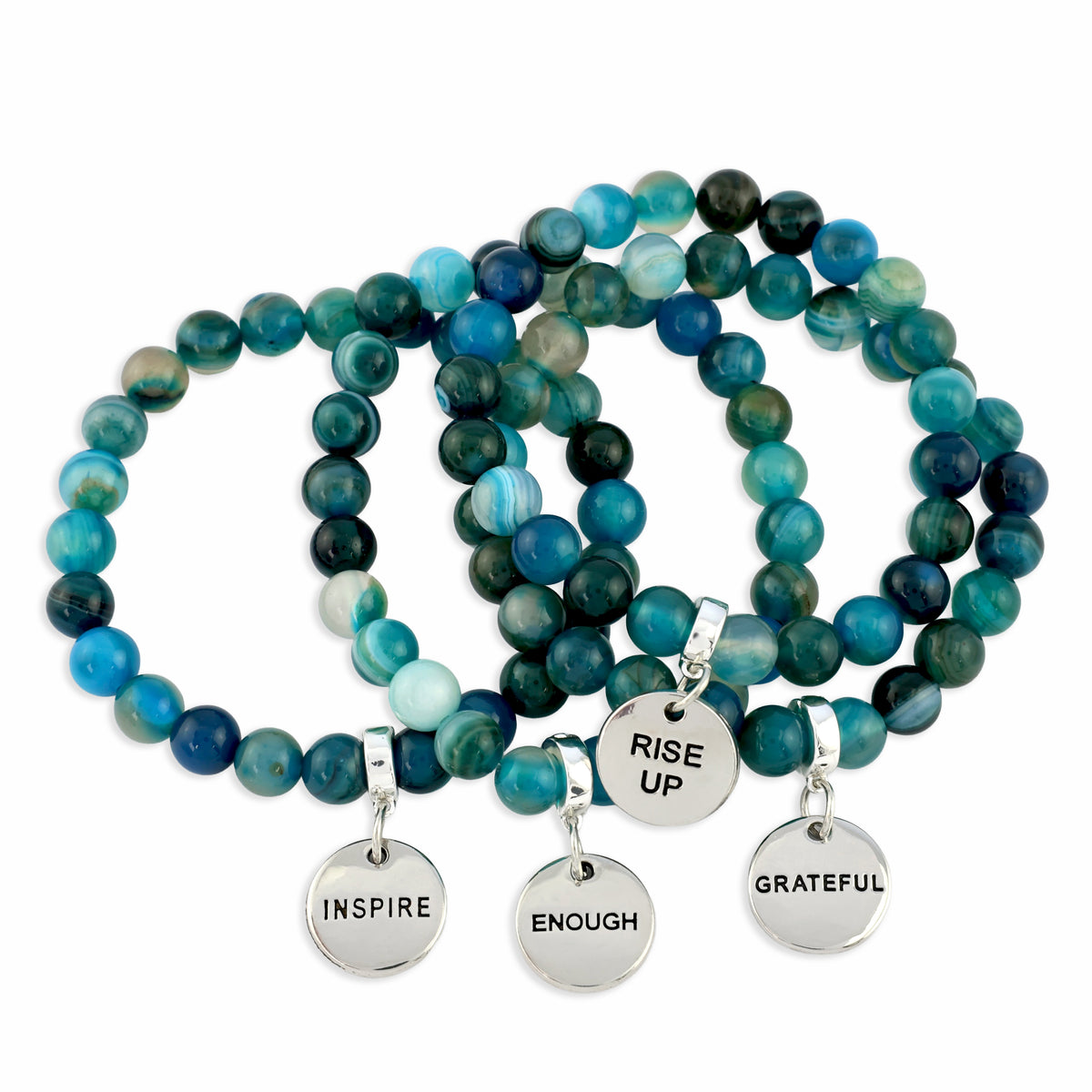 Set of blue beaded bracelets with motivational charms on a white background