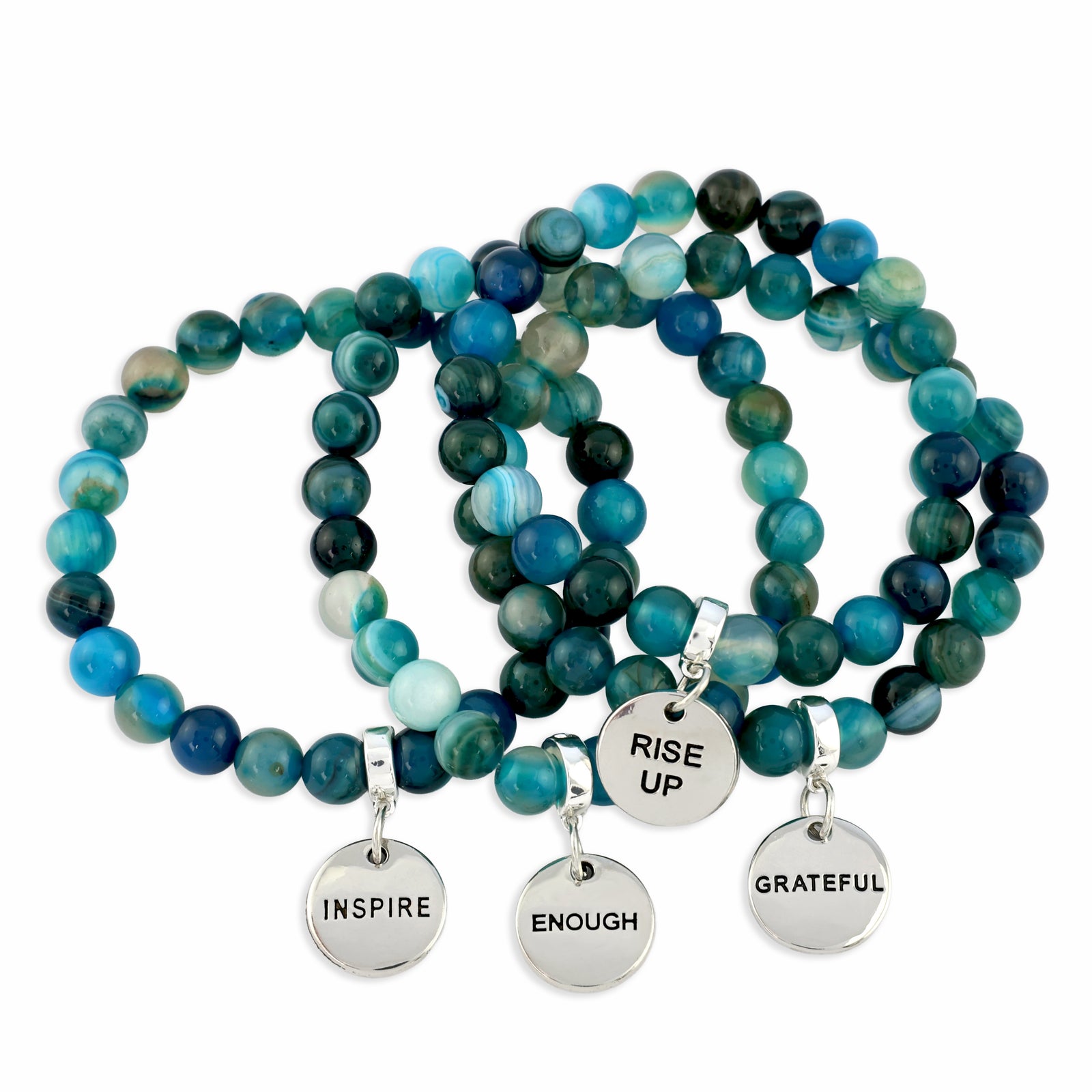 Set of blue beaded bracelets with motivational charms on a white background