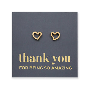 Gold heart-shaped earrings on a dark blue card with 'thank you for being so amazing' text.