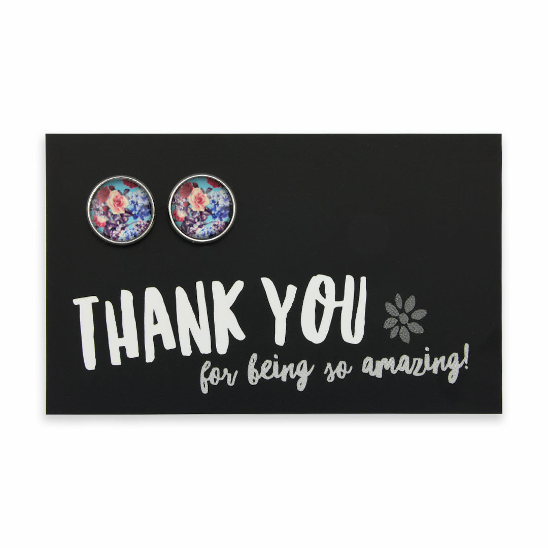 Floral earrings on a black card with 'Thank you for being so amazing!' text